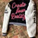 Love-Yourself-Cropped-Black-and-White-Varsity-Jacket-1.jpg