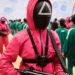 Squid-Game-Guards-Pink-Hooded-Jumpsuit-1-1.webp
