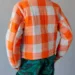 The-Chi-Season-5-Hannaha-Hall-Orange-Check-Jacket-2.jpg