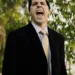 Will-Klipstine-The-Harbinger-2022-Daniel-Snyder-Black-Coat.webp